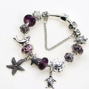 💜Cute charm bracelet🐢🐬🐚